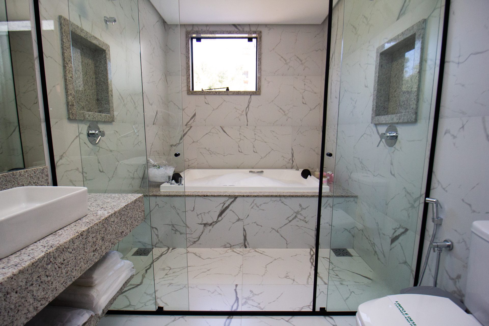 Marble bathroom of the Master Suite, with a hot tub