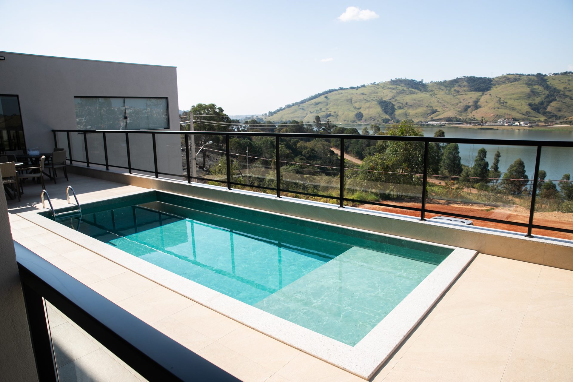 Pool at Bellville Pousada, overlooking Lake Furnas and the mountains